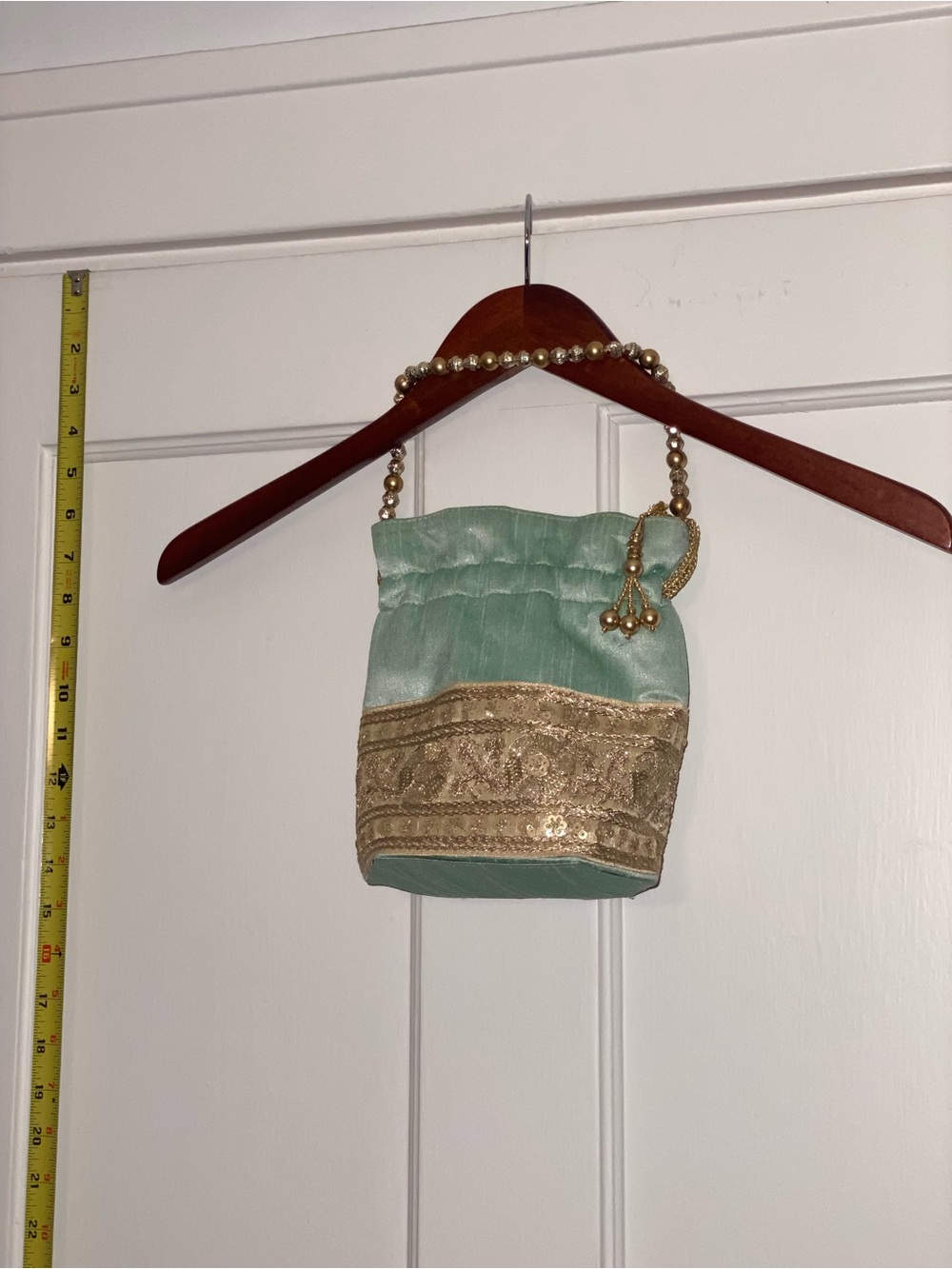 Decorative hand bag, blue and gold tone
